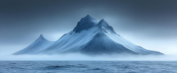 Snowy Mountain Peak In Misty Landscape