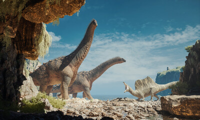 Massive dinosaurs roam a coastal landscape under a bright blue sky during daytime