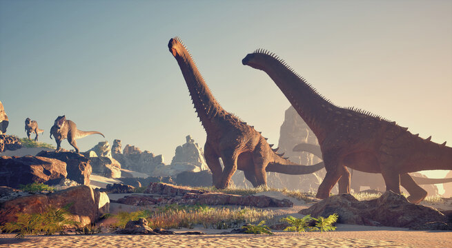 Dinosaurs roaming in a prehistoric landscape with rocky formations and lush vegetation during sunset