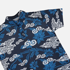 This photo features a vibrant batik polo shirt showcasing intricate patterns and rich colors. The...