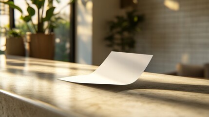 Blank White Paper Note on a Light Stone Desk