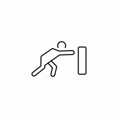 man pushing a box icon vector sign
