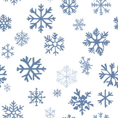 Fototapeta premium Snowflakes floating against a white backdrop, forming seamless winter pattern, scattered above