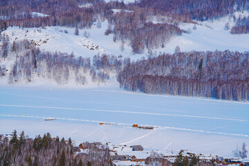 Hemu Village, Snowy Mountains, Forests, and Winter Snow Scenery in Xinjiang Uygur Autonomous Region, China On March 1st, 2023