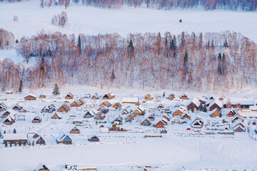 Hemu Village, Snowy Mountains, Forests, and Winter Snow Scenery in Xinjiang Uygur Autonomous Region, China On March 1st, 2023