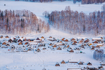 Hemu Village, Snowy Mountains, Forests, and Winter Snow Scenery in Xinjiang Uygur Autonomous Region, China On March 1st, 2023