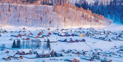 Hemu Village, Snowy Mountains, Forests, and Winter Snow Scenery in Xinjiang Uygur Autonomous Region, China On March 1st, 2023