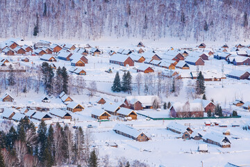 Hemu Village, Snowy Mountains, Forests, and Winter Snow Scenery in Xinjiang Uygur Autonomous Region, China On March 1st, 2023