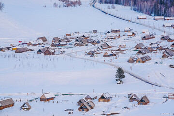 Hemu Village, Snowy Mountains, Forests, and Winter Snow Scenery in Xinjiang Uygur Autonomous Region, China On March 1st, 2023
