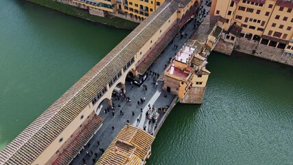 panoramic drone view of ponte vecchio and the arno river
