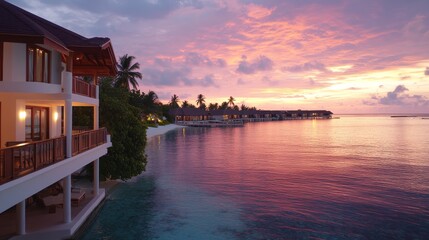 Fototapeta premium Tropical resort sunset view over water