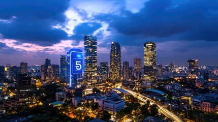Obraz premium Urban Skyline at Dusk with City Lights and Skyscrapers in Background