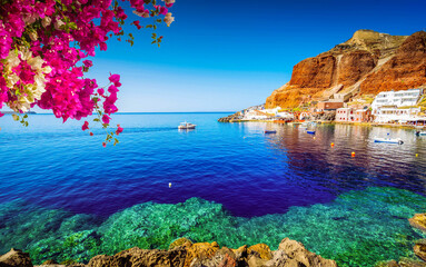 Amoudi bay with refreshing water, port of Oia, Santorini Greece at summer