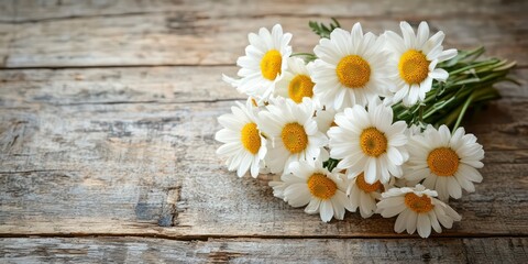 A bouquet of fresh-cut flowers on a rustic wooden table