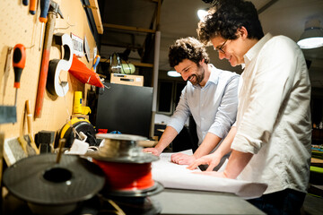 Two colleagues working on a plan together