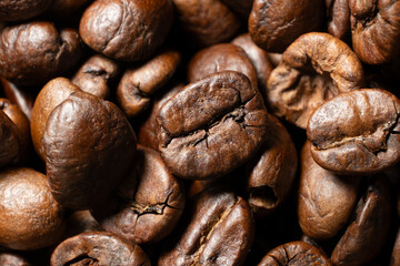 Decaffeinated coffee beans roasted close up