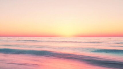 Obraz premium A serene beach sunset with soft pastel colors reflecting on calm ocean waves, creating a tranquil and picturesque scene.