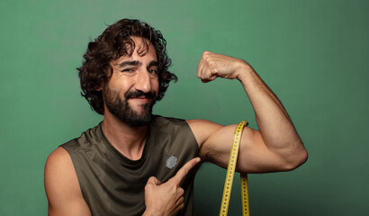 young adult bearded man. fitness and diet concept