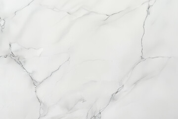 Naklejka premium A smooth, elegant white marble surface with subtle gray veining, perfect for a modern aesthetic in interior design.