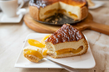 Homemade piece of cheesecake with apricots