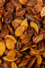 ripe pumpkin seeds fried to brown and golden