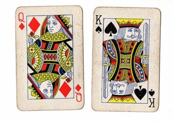 A blackjack or pontoon hand of vintage playing cards on a white background.