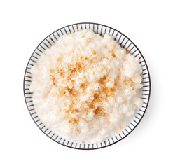 Tasty rice pudding with cinnamon isolated on white, top view