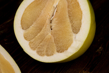 ripe pomelo with lots of pulp cut into pieces