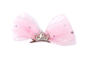 Cute hair clip with bow and diadem isolated on white, top view