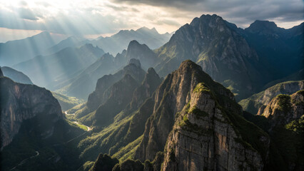 Fototapeta premium Majestic mountain landscape with dramatic lighting and valleys