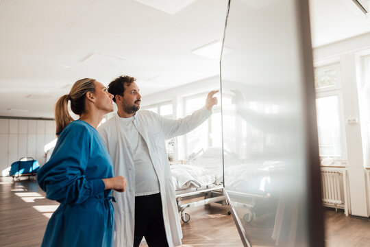 Medical professionals consulting in a clinic setting