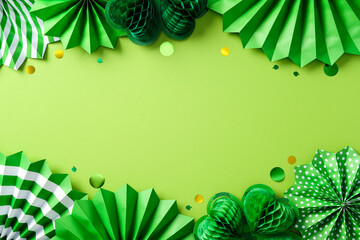 Green paper decorations on a light green background, perfect for St. Patrick's Day celebrations,...