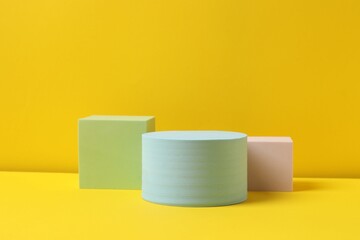 Podiums on a yellow background