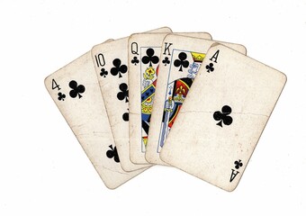A poker hand of grubby old playing cards on a white background,.