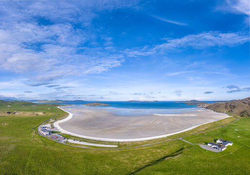 Aerial view of Traigh Mhor beach on the Isle of Barra, Scotland, known for its unique beach runway and spectacular landings.