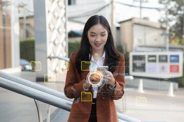 Businesswoman working on smartphone with digital document, managing files data.