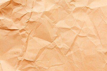 Fototapeta premium Crumpled beige paper with folded texture and wrinkles. Vintage material, old document and antique concept. Abstract background with copy space.