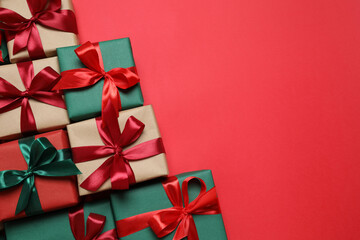 Beautiful gift boxes on color background 
