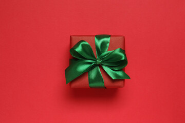Beautiful gift box on color background 