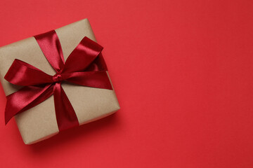 Beautiful gift box on color background 