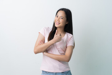 Obraz premium Woman feeling happy, doing thumbs up gesture