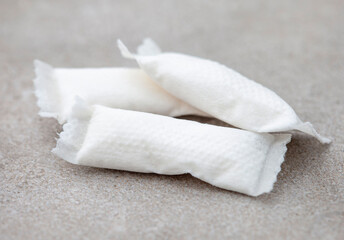 close up of three nicotine pouches