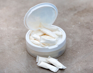 a white container of nicotine pouches