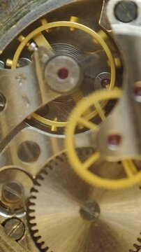 Metal Cogwheels inside clockwork. Macro. Concept Eternity, Teamwork , Idea Technology. Tick-Tick Sound