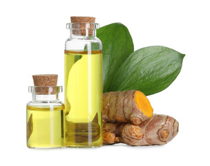 Bottles of turmeric essential oil, raw roots and leaves isolated on white