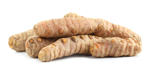 Pile of fresh turmeric roots isolated on white