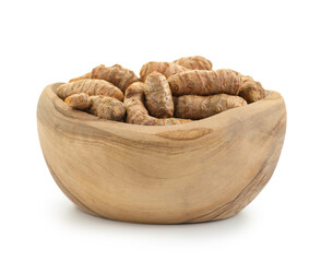 Raw turmeric roots in bowl isolated on white