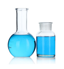 Glass flasks with light blue liquid on mirror surface against white background