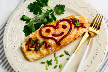 Omuraisu omelet with a smiley heart. Close up.