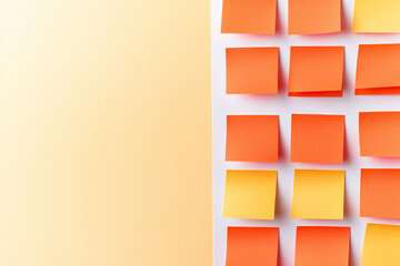Bright sticky notes in orange and yellow arranged on white background, ideal for brainstorming and organization